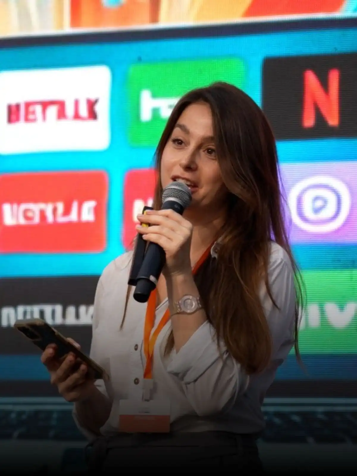 Marina Povkh speaking at an industry event